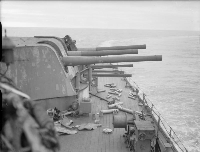 The two forward 6-inch gun turrets of the Town class cruiser HMS SHEFFIELD after she had opened fire and sunk the German tanker FRIEDERICH BREME in the North Atlantic. Comment : Note the rounded contours of the Mk XXII t
