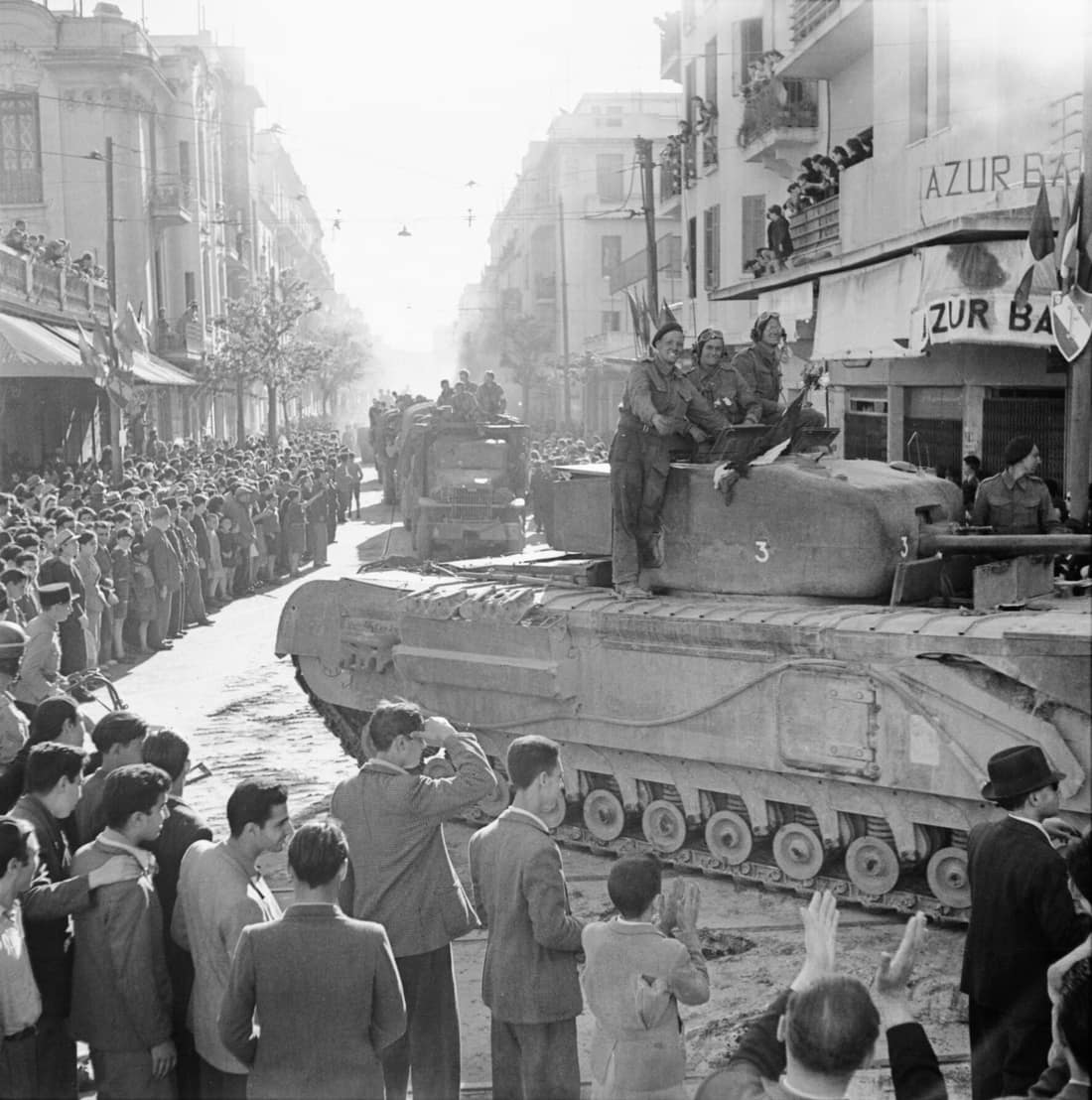 A Churchill tank and other vehicles parade through Tunis, 8 May 1943. A Churchill tank and other vehicles parade through Tunis, 8 May 1943.