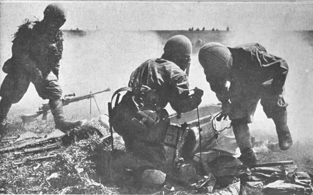 Imperial Japanese Army paratrooper are accessing their cargo container to get out light machine guns, rifles and grenade launchers during the battle of Palembang, February 13, 1942.