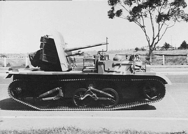 AWM photo caption: c.1943. A side view in a travelling position of a modified version of a machine gun carrier fitted with a 2 pounder anti-tank gun on turntable at rear. It is all mounted on a universal carrier chassis.