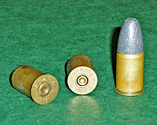 British .455in SAA Ball (Webley 455) ammunition. The empty cartridge cases are the military WD issue and a civilian Kynoch. Picture taken by me Ian Dunster in April 2006.