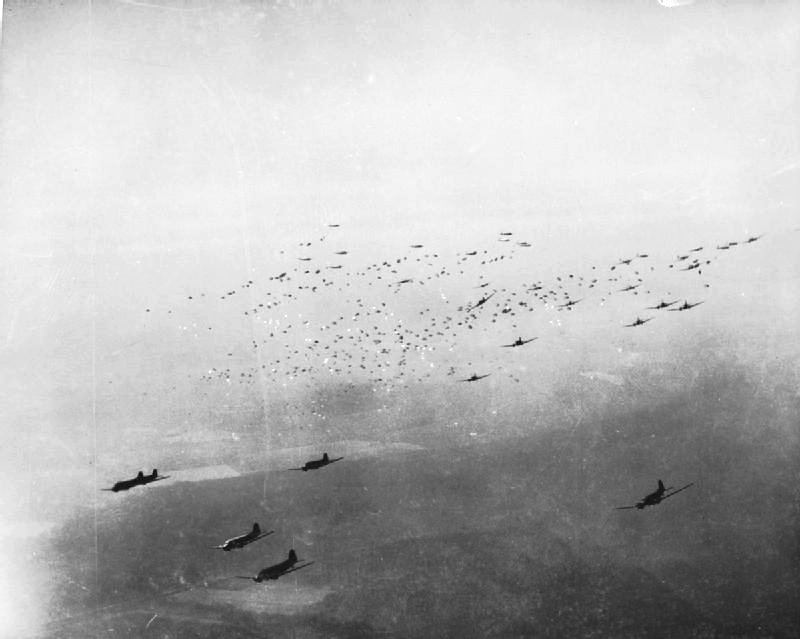 IWM caption : Crossing the Rhine 24 -31 March 1945: C-47 transport planes release hundreds of paratroops and their supplies over the Rees-Wesel area to the east of the Rhine. This was the greatest airborne operation of t