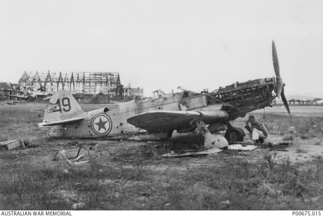 KIMPO, KOREA, 1950. A DAMAGED NORTH KOREAN YAK AIRCRAFT STANDING ON THE AIRFIELD. (DONOR: R. TREBILCO)